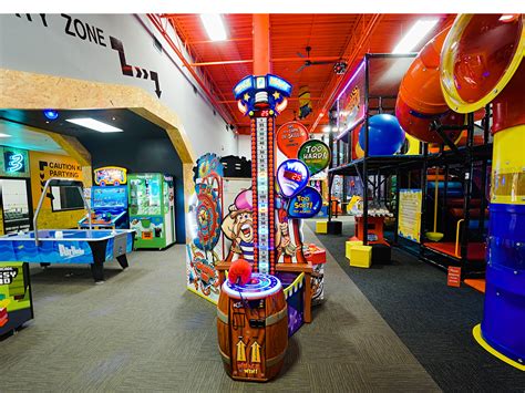 Inside playground - OutSlide In | Charleston's Indoor Playground. Located in the Belk wing of the Citadel Mall, OutSlide In features a giant play structure with 5 slides, 3 party rooms, a toddler area, and a mini city for imagination play!
